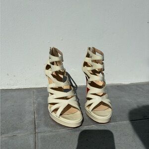 Cream Louboutin a little bit used on the bottom